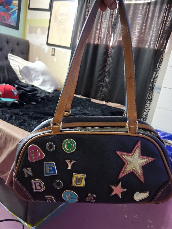 Black Shoulder Bag with Tan Handles and Multicolor Patch Accents